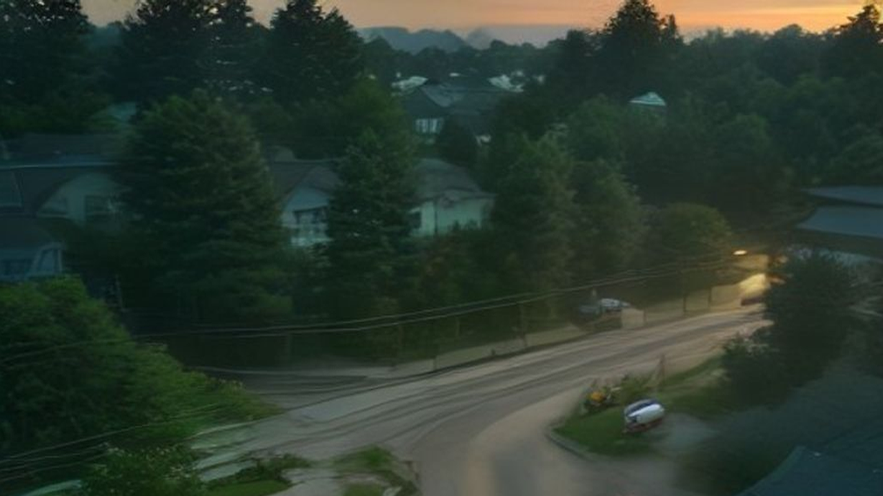 Fiber construction crew extending broadband along a suburban street